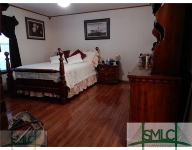 Master Bedroom. Master with hardwood floors on mai