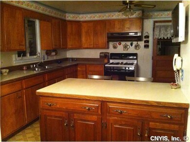 Kitchen Plenty of Cabinets including under the bre