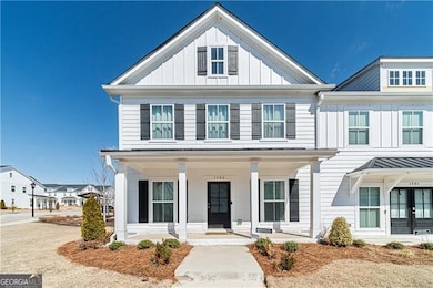 View of front of property featuring covered porch 