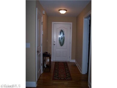 Entry. Entry which leads into the open living room and kitchen area.