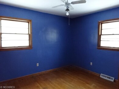 Bedroom 3 has hardwood floors