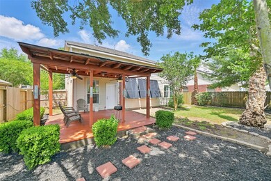 Unwind on the covered patio, beautifully nestled a