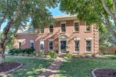 Mature trees welcome you to desirable Buckingham in this renovated, shade-filled home, with rooms for everyone.