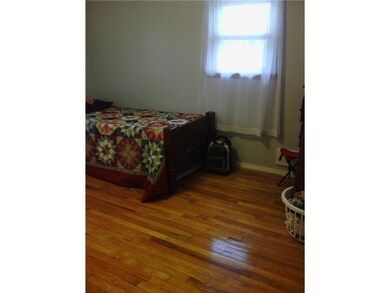 Bedroom. One of three bedrooms on main level, orig