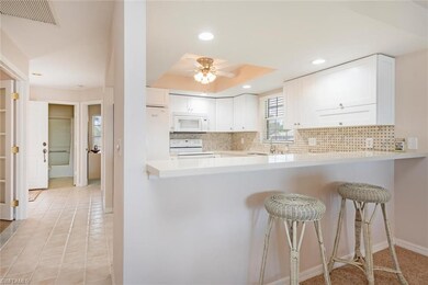 Renovated Kitchen with tile backsplash