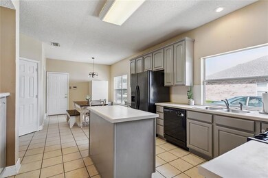 View of the kitchen from the formal dining room