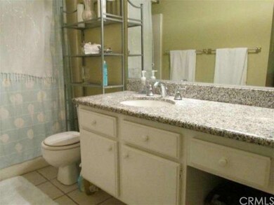 Full bathroom has ceramic tile flooring and granit