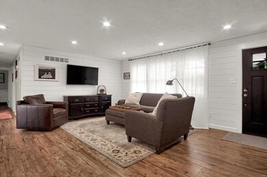 Living Room New can lights, shiplap and flooring