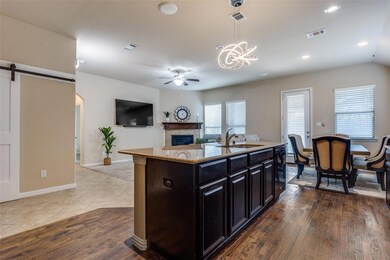 Kitchen connects with dining and living areas