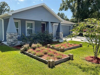 Front Elevation with Flower Beds View
