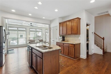Kitchen opens to dining room