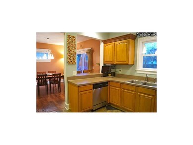 Open kitchen to dining and breakfast bar/buffet