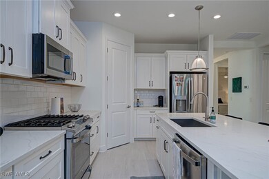 Kitchen featuring appliances with stainless steel