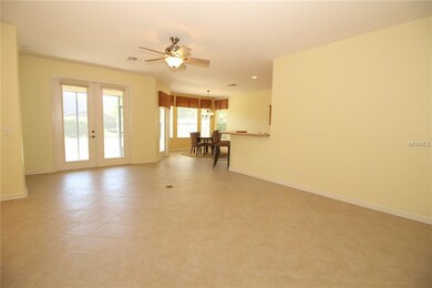 15'x22' Great Room w/ ceramic tile and french door