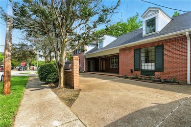 Circular driveway,
S. Robertson St. side