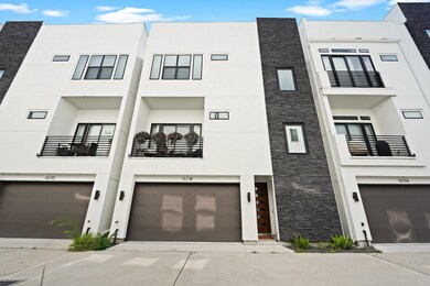 This modern townhouse features a sleek, contempora