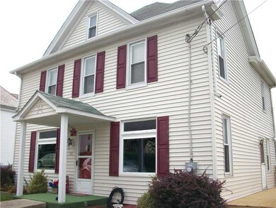 Exterior Front. Side view with new decking