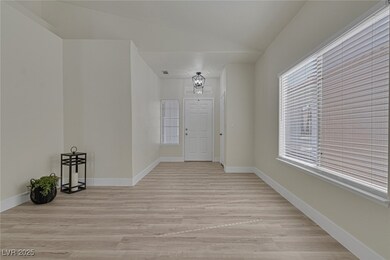 Spare room with light wood finished floors, basebo