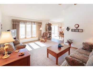 Living room with awesome views to Stark Lake!