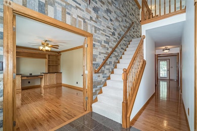 Entry with granite tile flooring, custom stack sto