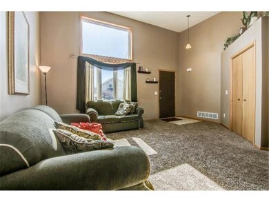 Inviting living room boasts huge picture window ne
