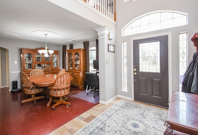 This front formal dining area, left, boasts rich e