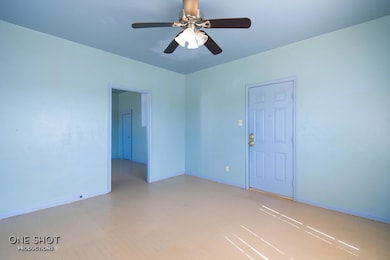 Spare room featuring ceiling fan