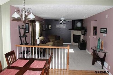 This better than new home has an open floor plan that is great for famlies or entertaining. Warm colors through out the home! Living room features a built in surround stereo system.