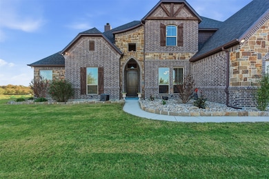 FRONT ENTRY WITH LARGE SPRINKLERED FRONT YARD