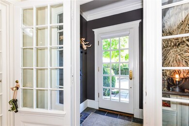 Vestibule entry way with slate floor.