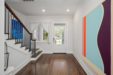 Sunlight pours through glass paneled doors and win