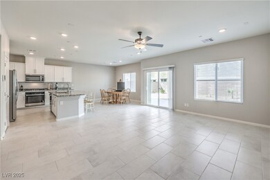 Kitchen featuring visible vents, light stone count