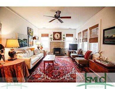 Living Room. Beautiful stone wood burning fireplac