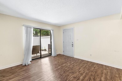 Spare room with dark hardwood / wood-style floors 