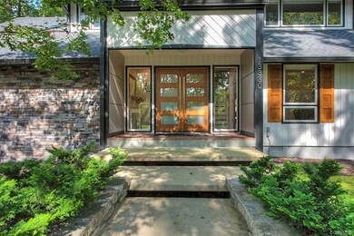 Spectacular Mahogany doors and shutters welcome as