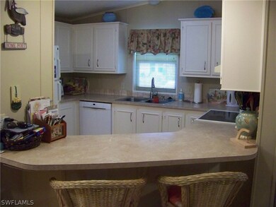Convenient pass through/breakfast bar!!!