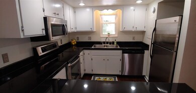 Updated kitchen, tons of cabinets