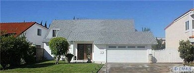 Pride of ownership with 3 car driveway parking PLUS 2 car garage PLUS  RV parking on side.