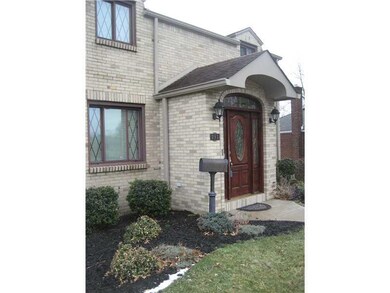 Exterior Front. Newer entry/ceramic foyer with oak