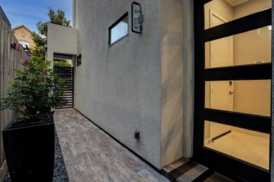 A glass entry door welcomes you into the main-floo