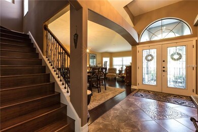 Grand Entrance!!  Leaded Glass Doors, Custom Tile 