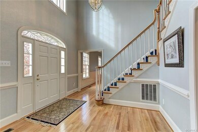 Two story foyer is bright and welcoming!