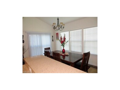 Morning Rm with Breakfast Bar. Sliding Glass Doors