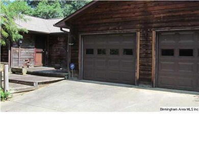 VERY SPACIOUS 2 CAR MAIN LEVEL GARAGE JUST STEPS F