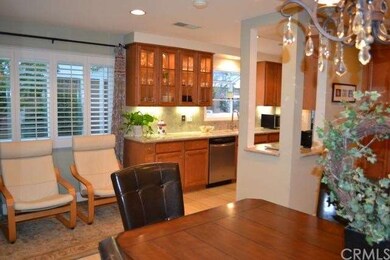 Beautifully lit glass cabinets in kitchen