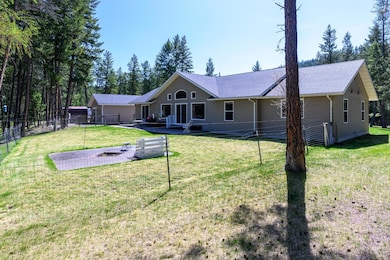 Fenced yard with space to garden or play
