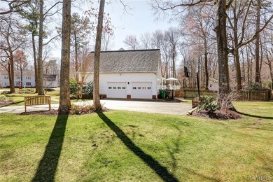 Paved Driveway and Attached 2 Car Garage