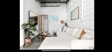 Living area with finished concrete flooring
