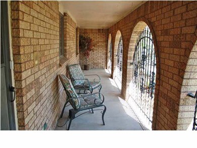 This sturdy ranch also includes a covered front co