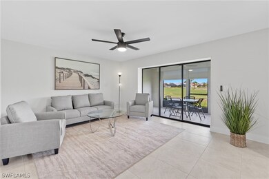 Living room featuring light tile patterned floors